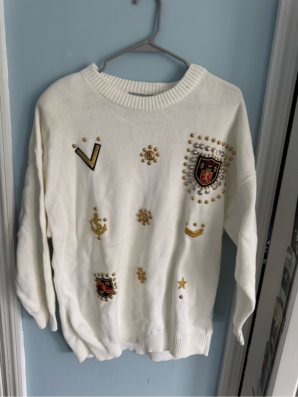 Unlisted White Crewneck Sweater with Gold Emblem Embellishments